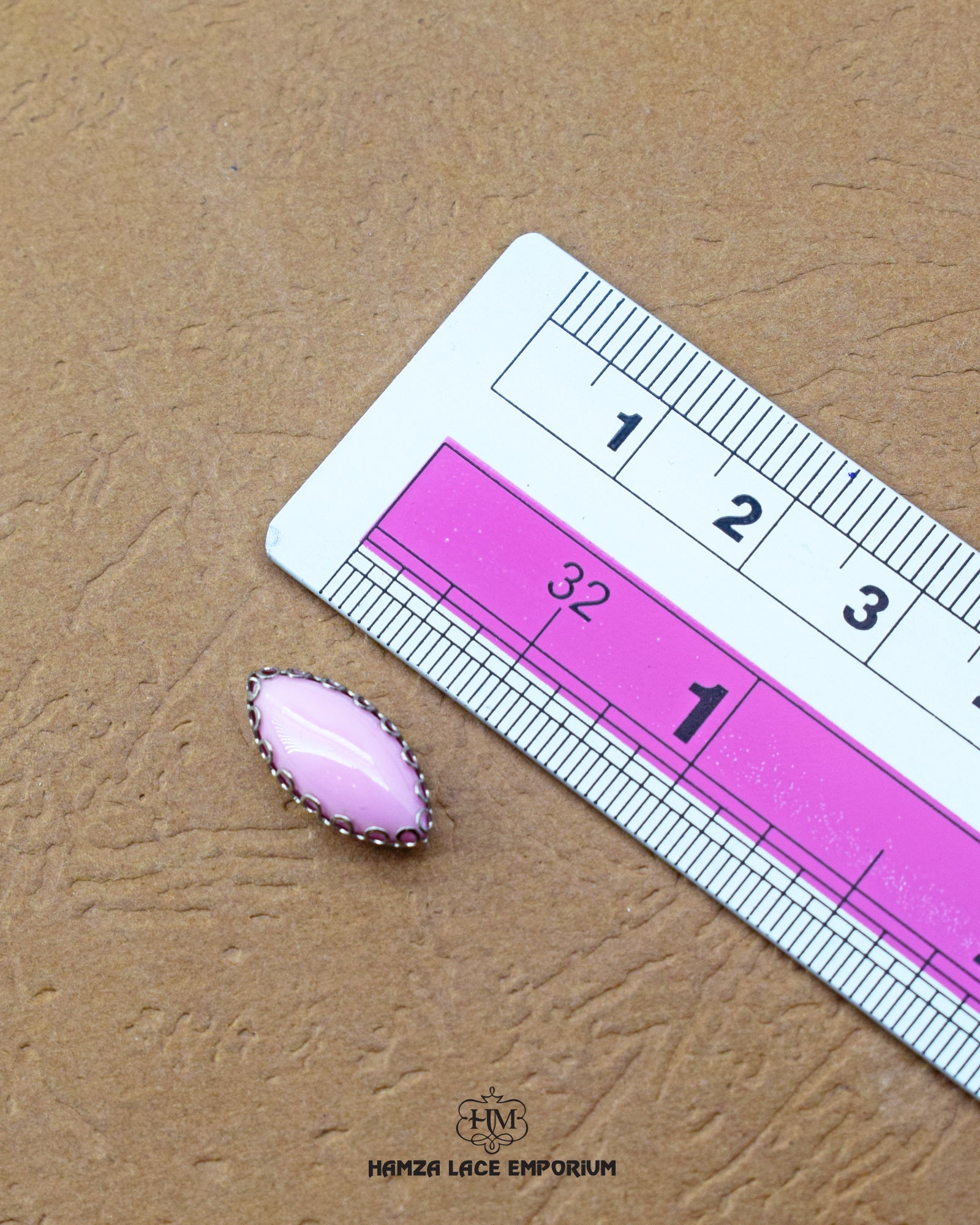 The size of the 'Drop Shape Metal Button MB566' is indicated using a ruler.