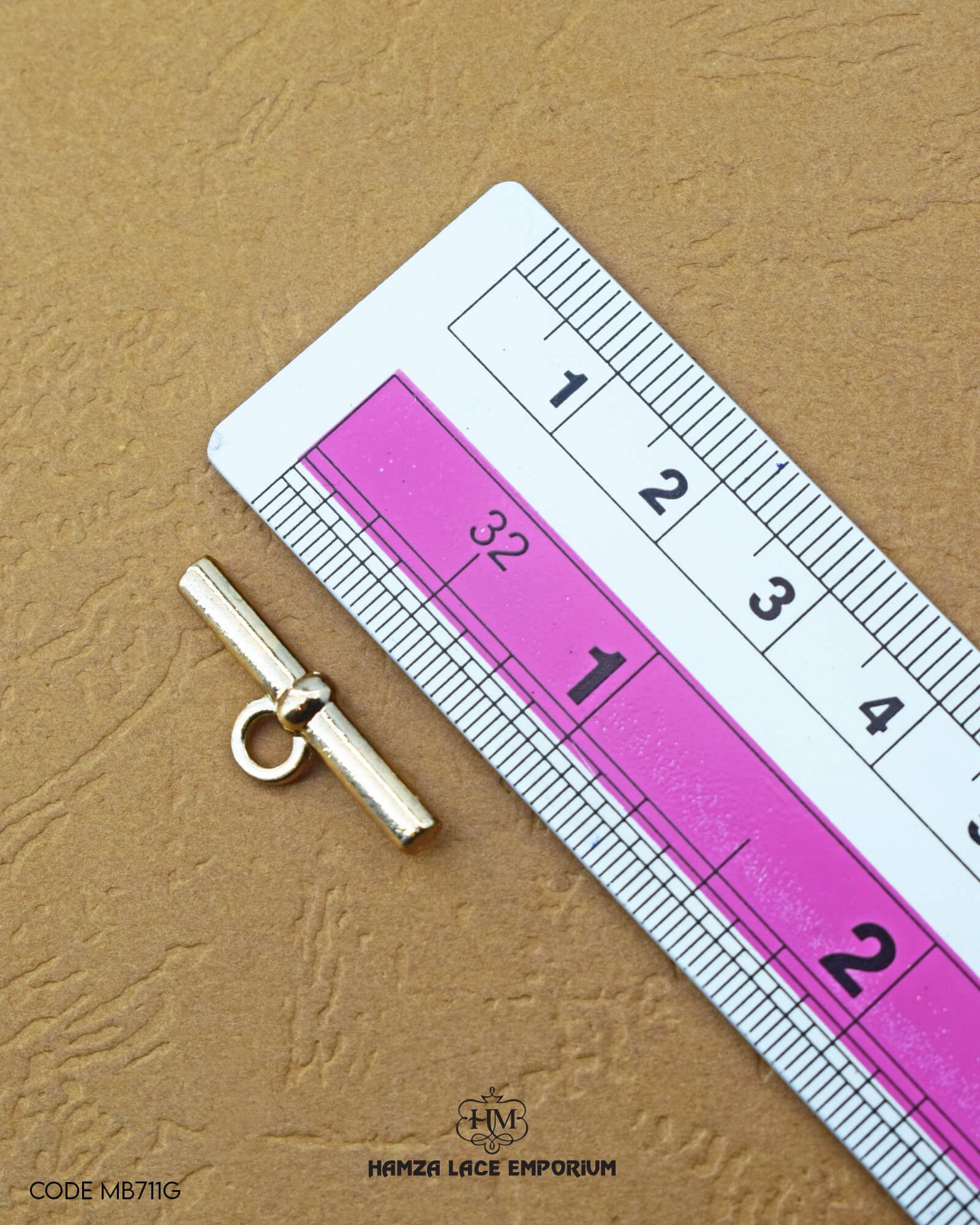 Size of the 'Metal Hanging MB711' is given with the help of a ruler