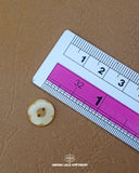 Size of the 'Flower Design Button MB750' is given with the help of a ruler