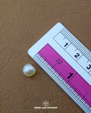 Size of the 'Plain Metal Button MB804' is given with the help of a ruler