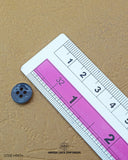 The dimensions of the 'Black Metal Button MB834 Media 2 of 2' are determined using a ruler.