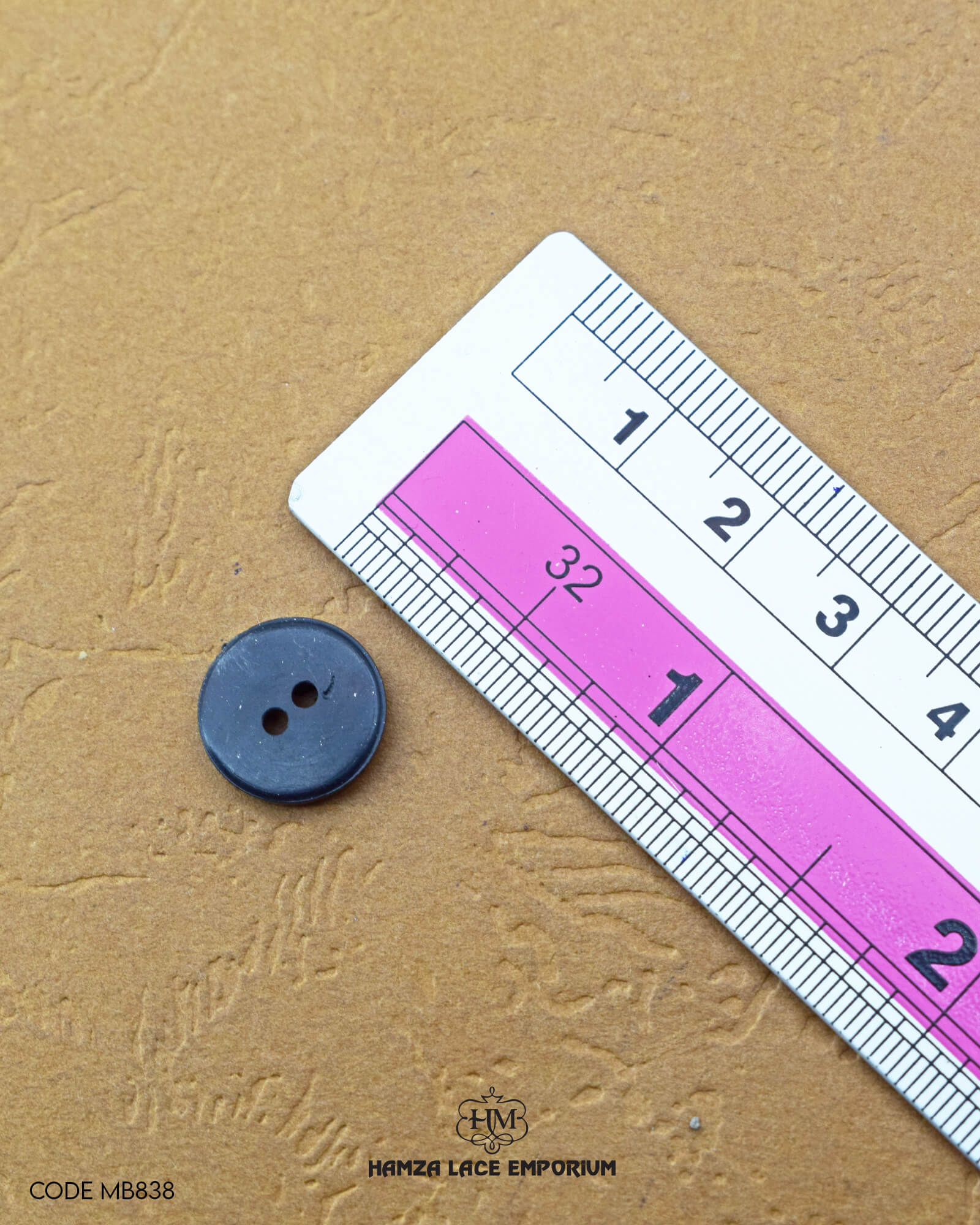 the size of the '4 Hole Plastic Button MB838' is shown using a ruler