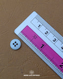 The dimensions of the '4 Hole Plastic Button MB838' are determined using a ruler.