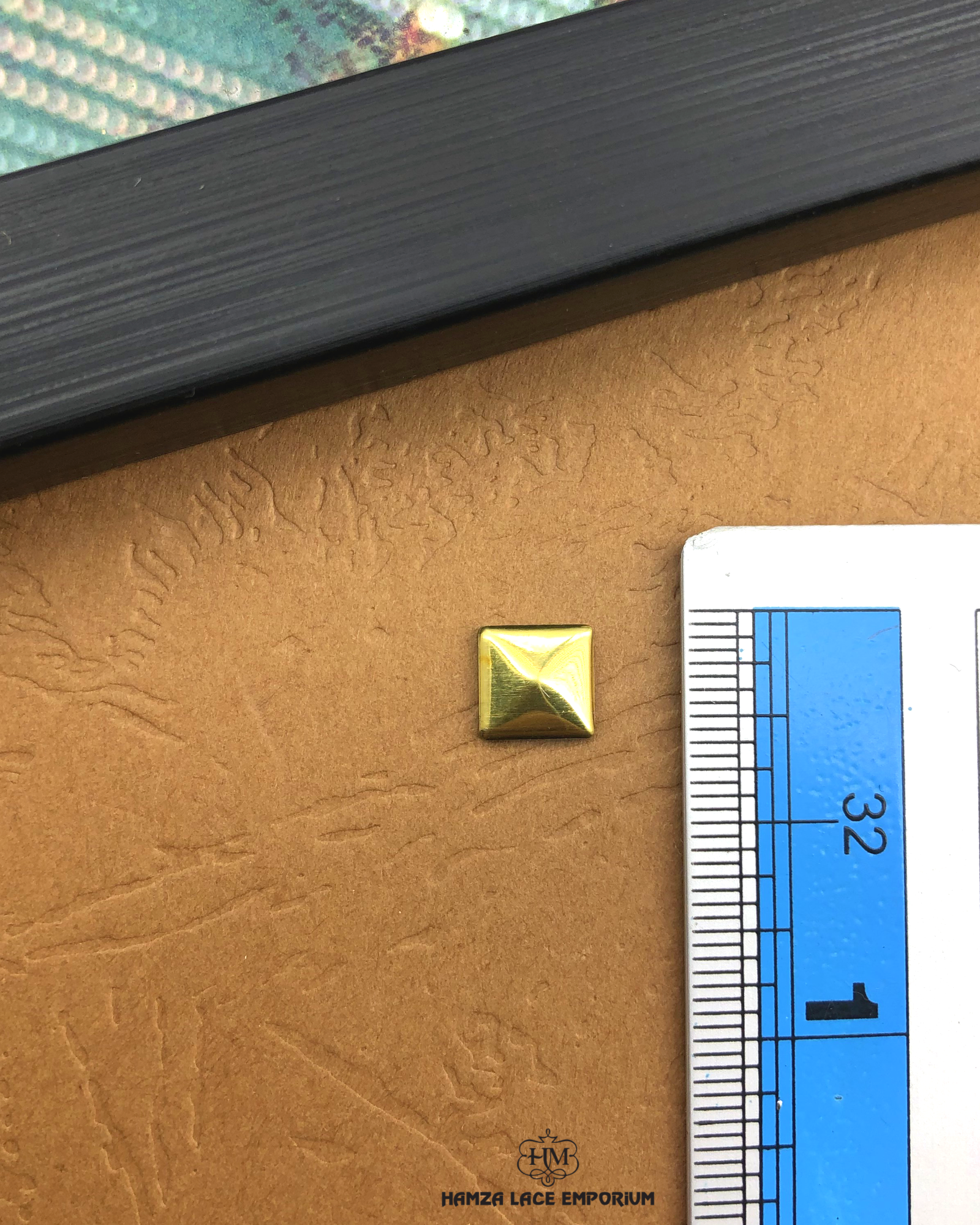 The size of the Beautifully designed 'Square Shape Plastic Accessory PB115' is measured by using a ruler