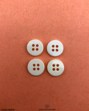 'Four Hole Plastic Button PB010' - suitable for fashion and decorative purposes