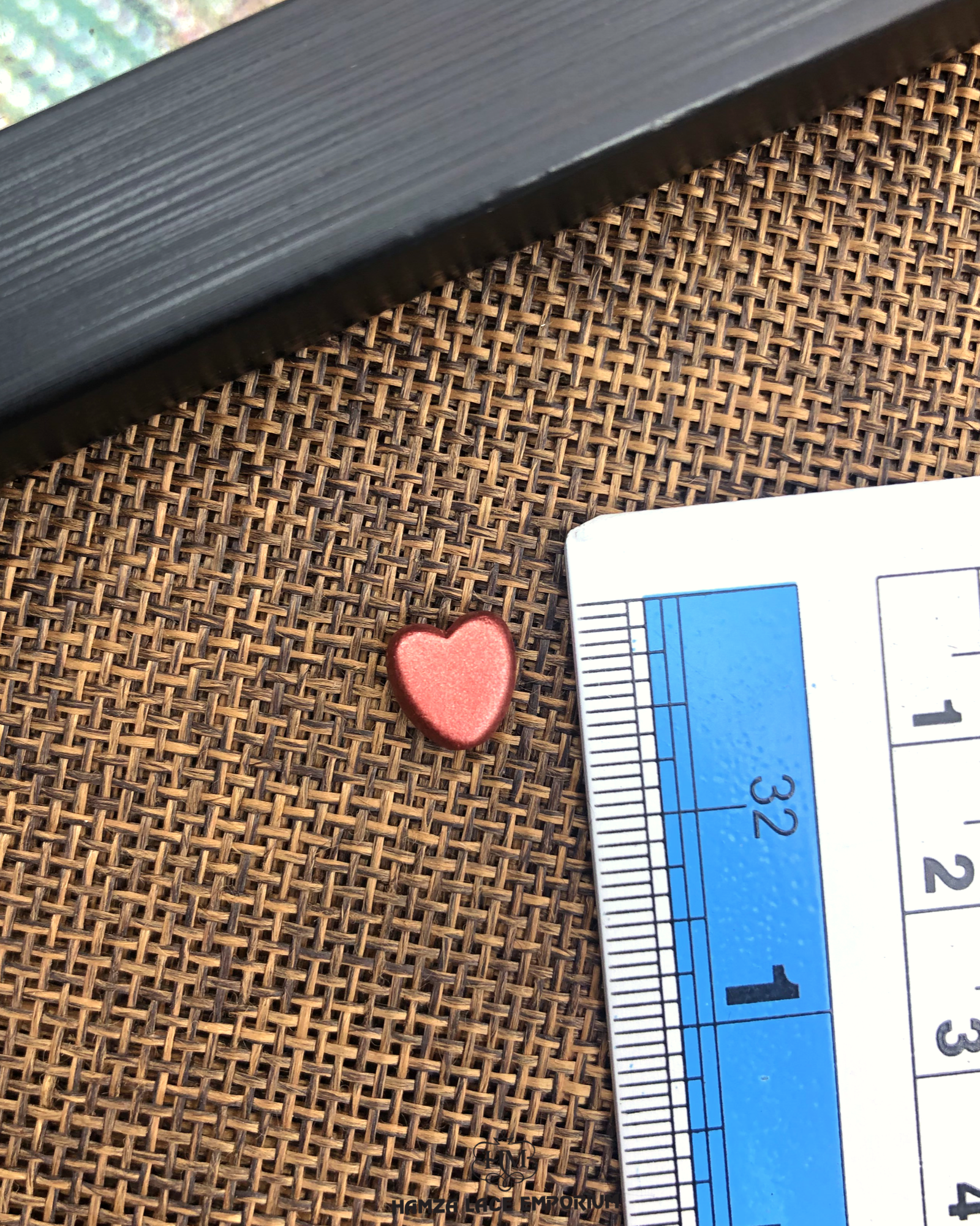 The size of the Beautifully designed 'Heart Shape Accessory PB099' is measured by using a ruler