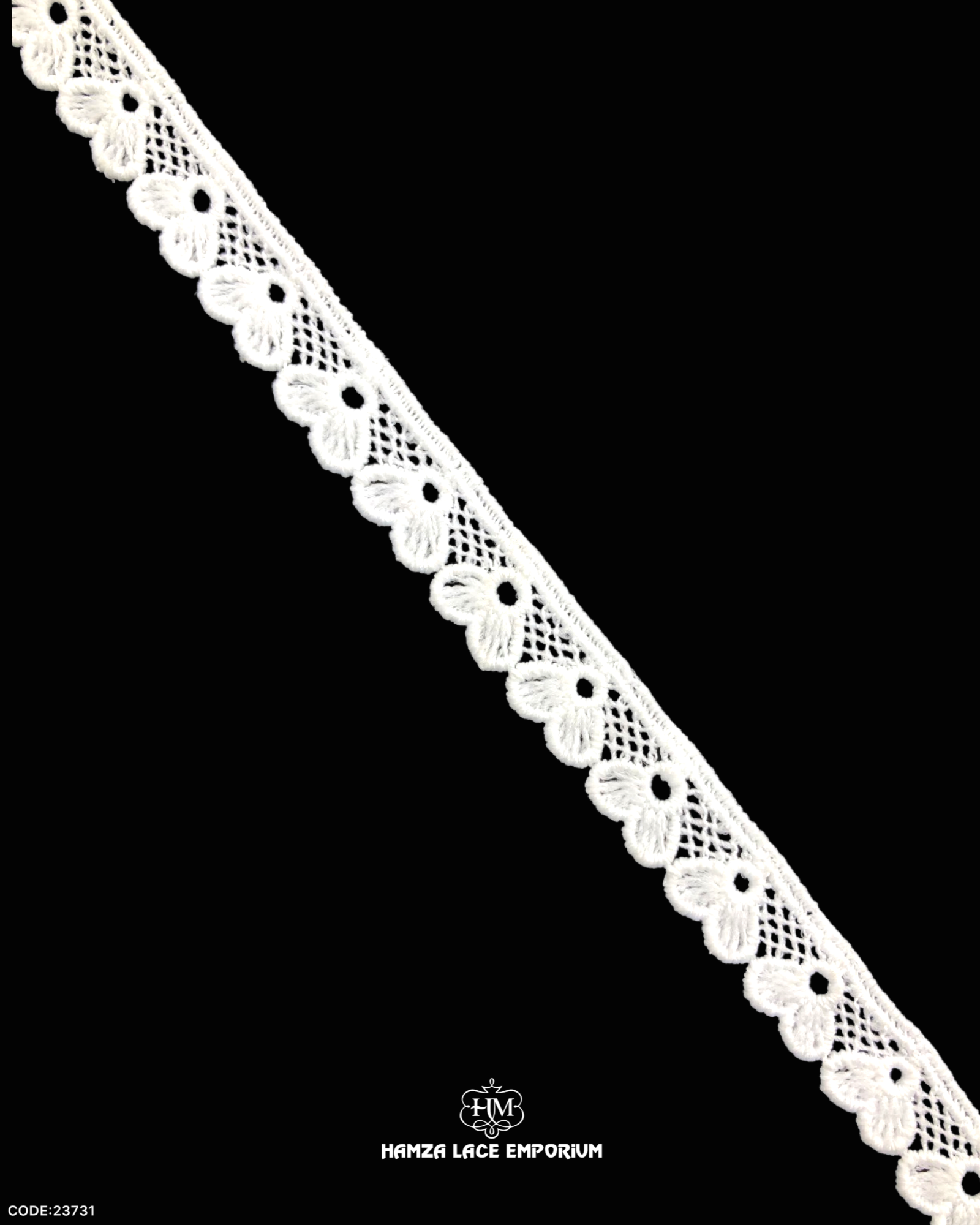 A white piece of the 'Edging Lace 23731' on a black background and the 'Hamza Lace' sign and logo at the bottom is written with white color